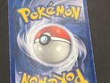 a pokemon card sitting on top of a table