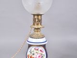 an image of a lamp with a glass shade on it