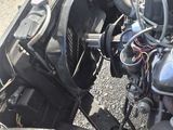 a close up of a car engine with a lot of wires