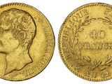 l'image d'une pièce d'or représentant la tête d'un homme de profil