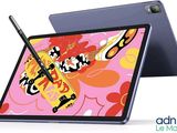an image of a tablet with a pen sitting on top of it