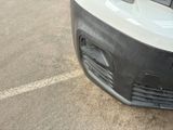 a close up of the front bumper of a car