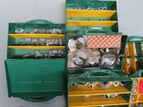 a green and yellow truck with lots of items in it