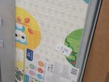a refrigerator that has a lot of stickers on it