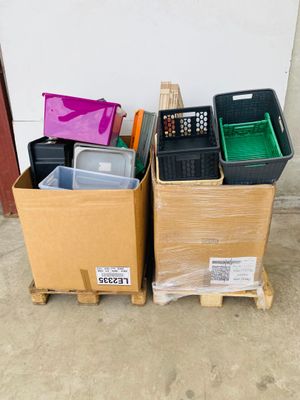 many boxes that are sitting on a pallet