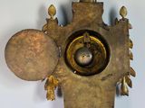 a clock that is hanging on the wall