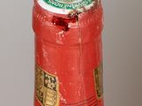 a close up of a bottle of wine on a table