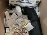 a box full of medical wipes and other items in it