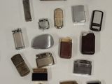 a lot of different types of electronic devices on the table