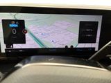 the dashboard of a car with a gps device on it