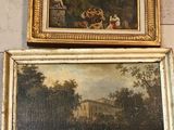 two framed paintings of people in a park and a building