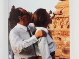 an image of a book with a picture of a man hugging a woman