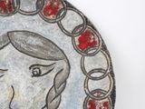 a painting of a woman on a plate with a chain around her neck