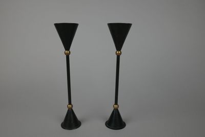 paire de bougeoirs noirs et dorés