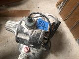 an image of a water pump in a garage