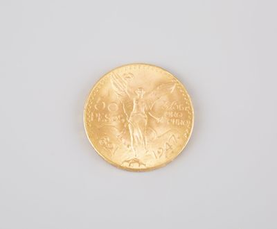 an image of a gold coin on a white surface