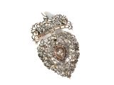 an image of a broochle with a heart shaped broochle on top of it