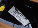 the inside of a brown bag with a label on it