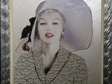 a picture of a picture of a woman wearing a hat