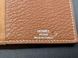hermes paris bifold wallet in brown leather with white stitching