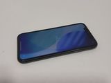 an image of a close up of a cell phone on a table