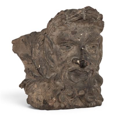 sculpture of a head of a man with a beard and a hat