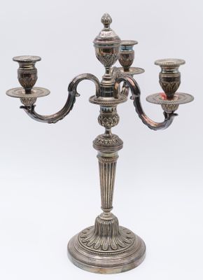 silver plated candelabra with four candles and a bird