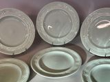 six plates that are sitting next to each other on a table