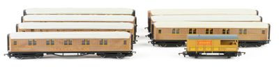 four train cars that are sitting next to each other