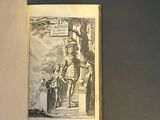 an open book with a drawing of a man on a horse and a woman on a horse