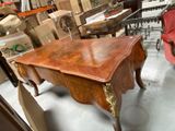 a desk that is sitting in the middle of a room