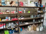 many boxes and boxes on the shelves in the garage