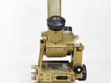 an old brass microscope with a white background and a white background