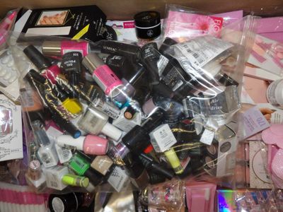 a box full of cosmetics and other items in it