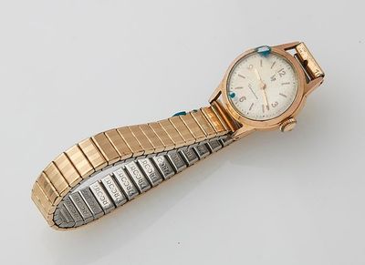 rolex a lady ' s 18ct gold and diamond set bracelet watch