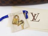 a bag with a lock and a key on it