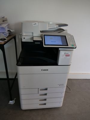 a printer that is sitting on top of a table