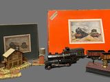 a picture of a toy train set with a picture of a train