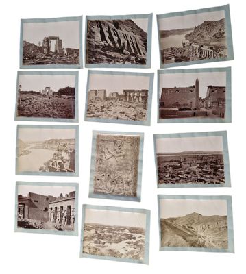 many pictures of ancient buildings in the desert