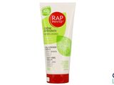 un tube de savon orné d'une feuille verte