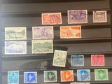 a lot of stamps on the wall of the room