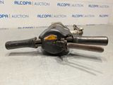 a close up of a metal pipe cutter on a table