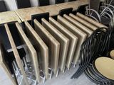 many chairs and a radiator in a room