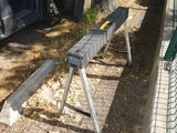 a bench that is sitting on the side of the road