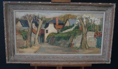 an oil painting of a house and trees on a easel