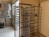 an image of a kitchen with a rack of food in it