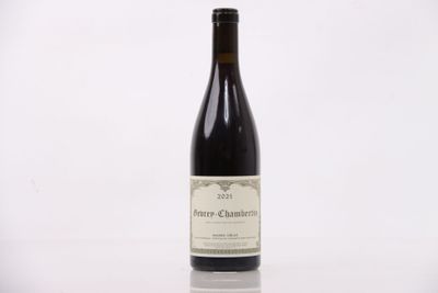 a bottle of wine that is sitting on a table