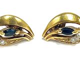 an image of a pair of gold earrings with blue and white stones
