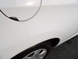 a close up of a car ' s door handle on the side of the car