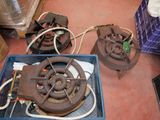 a blue box with a fan and some wires on the floor
